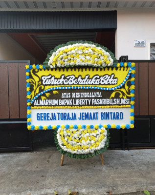 Papan Bunga Duka di Dukun
