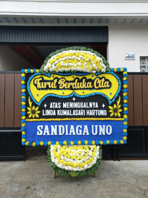 Papan Bunga Duka di Dukun